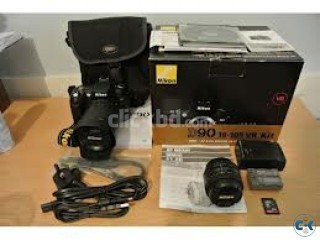 Nikon D90 Digital Camera with 18-135mm Lens... 520
