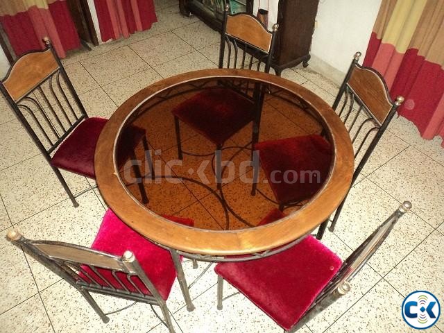 Glass centered round dining table with six chair full set . large image 0