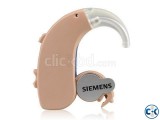 Siemens touching behind-the-ear digital hearing aid has digi