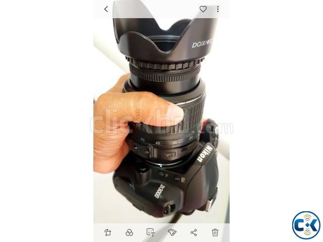 Nikon D3000 Dslr with lens large image 0