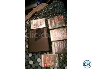 xbox 360 with 5 original games