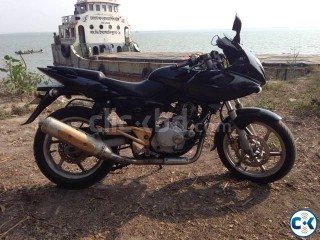 Pulsar 220 with auction paper