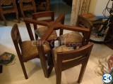 Dining table frame with four chairs