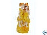 Yellow color Ceramic Dolls showpiece QHH31999 