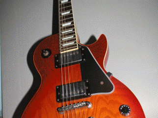 An electric guitar for sell Les Paul Wooden red 