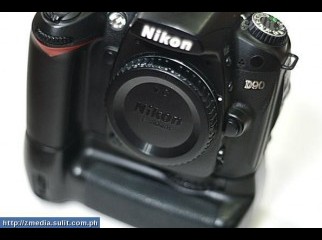Nikon D90 with battery grip with 3 lens flash gun for sale